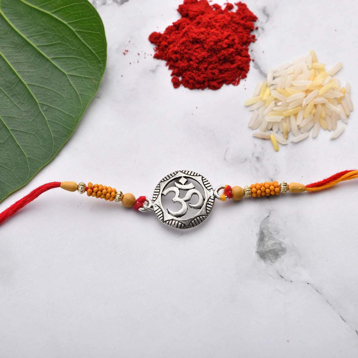 Rakhi with OM icon on Round